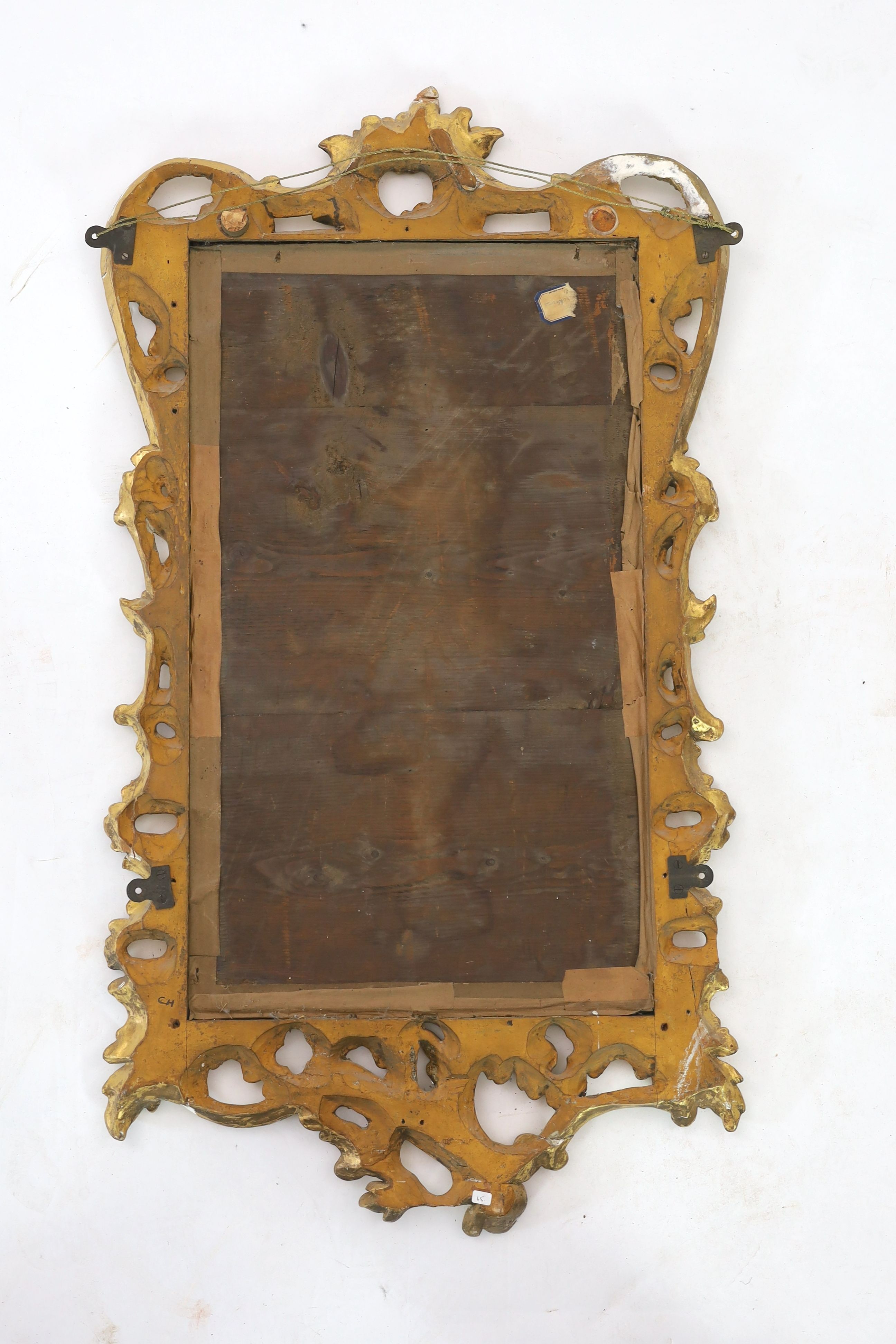 A George III carved giltwood wall mirror, W.50cm H.92cm